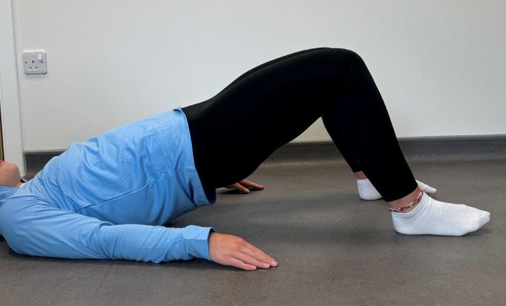 Lying On Back Knees Bent Hips Lifted