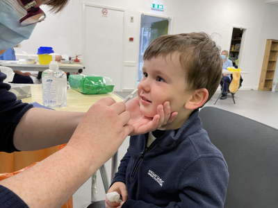 young child receiving vaccine