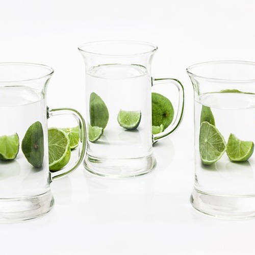 jugs of water and limes