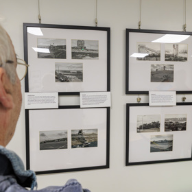 Man Looks At Pictures