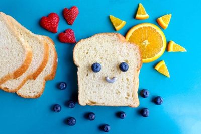 fruit cut to make shapes of sun hearts and smiley face