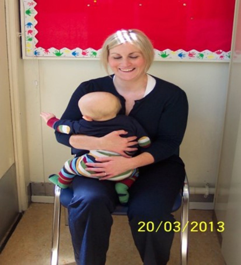 Mother Holding Resting Baby