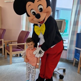 Mickey mouse and young girl