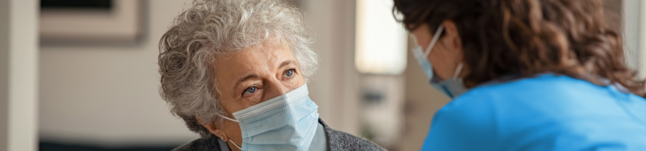 Nurse comforting patient
