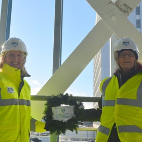 Two people on construction site
