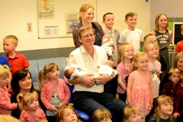 Nine sets of triplets give retiring obstetrician the perfect send-off