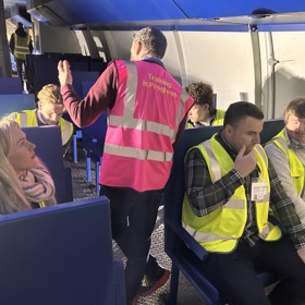 Students on board airplane simulation