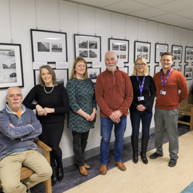 Group In Front Of Exhibition