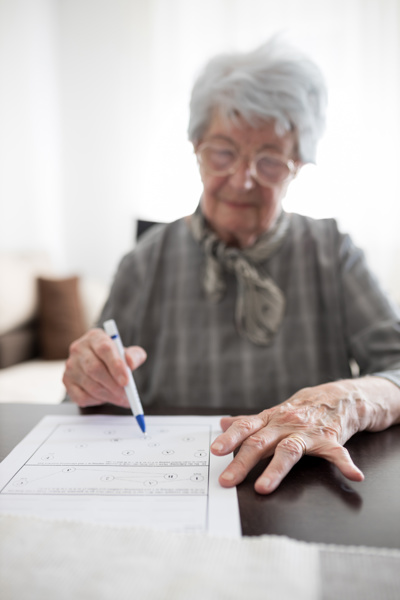 older woman filling out form