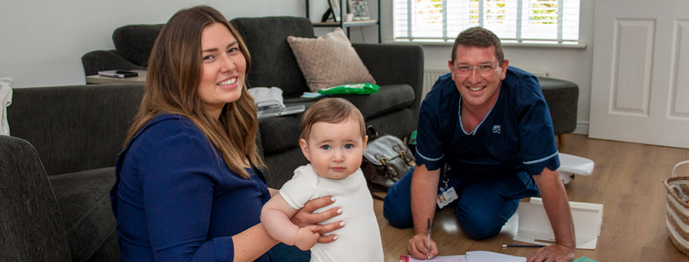 Family With Health Visitor
