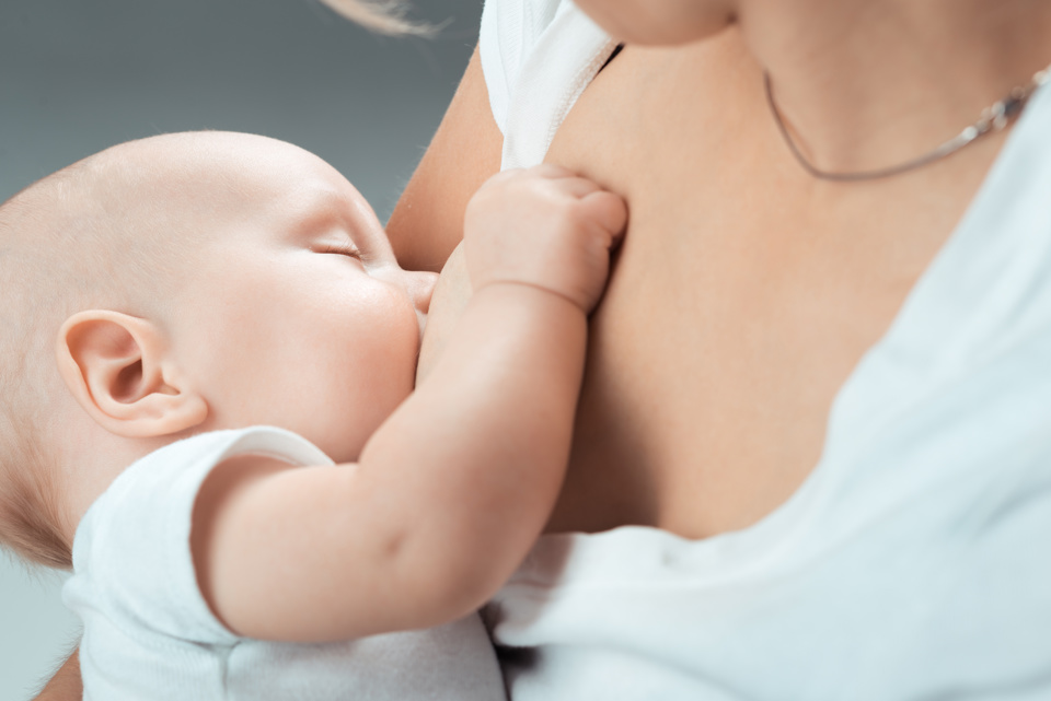 Baby being breast fed Adobestock 59126567