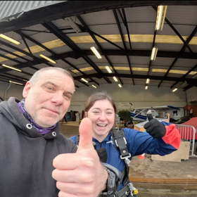 Parachute Instructor Giving Thumbs Up On Ground