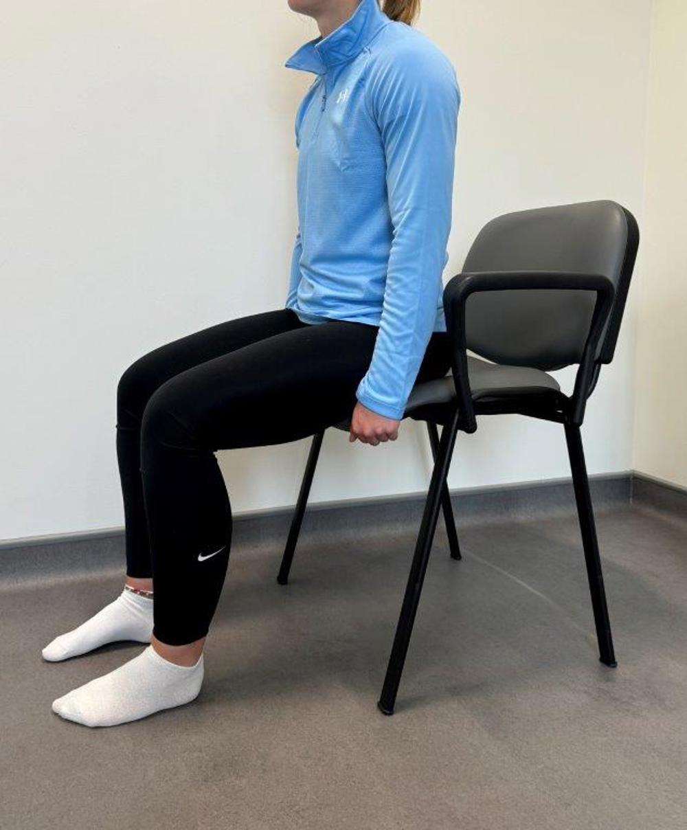 Sitting On Chair Pull Toes Up