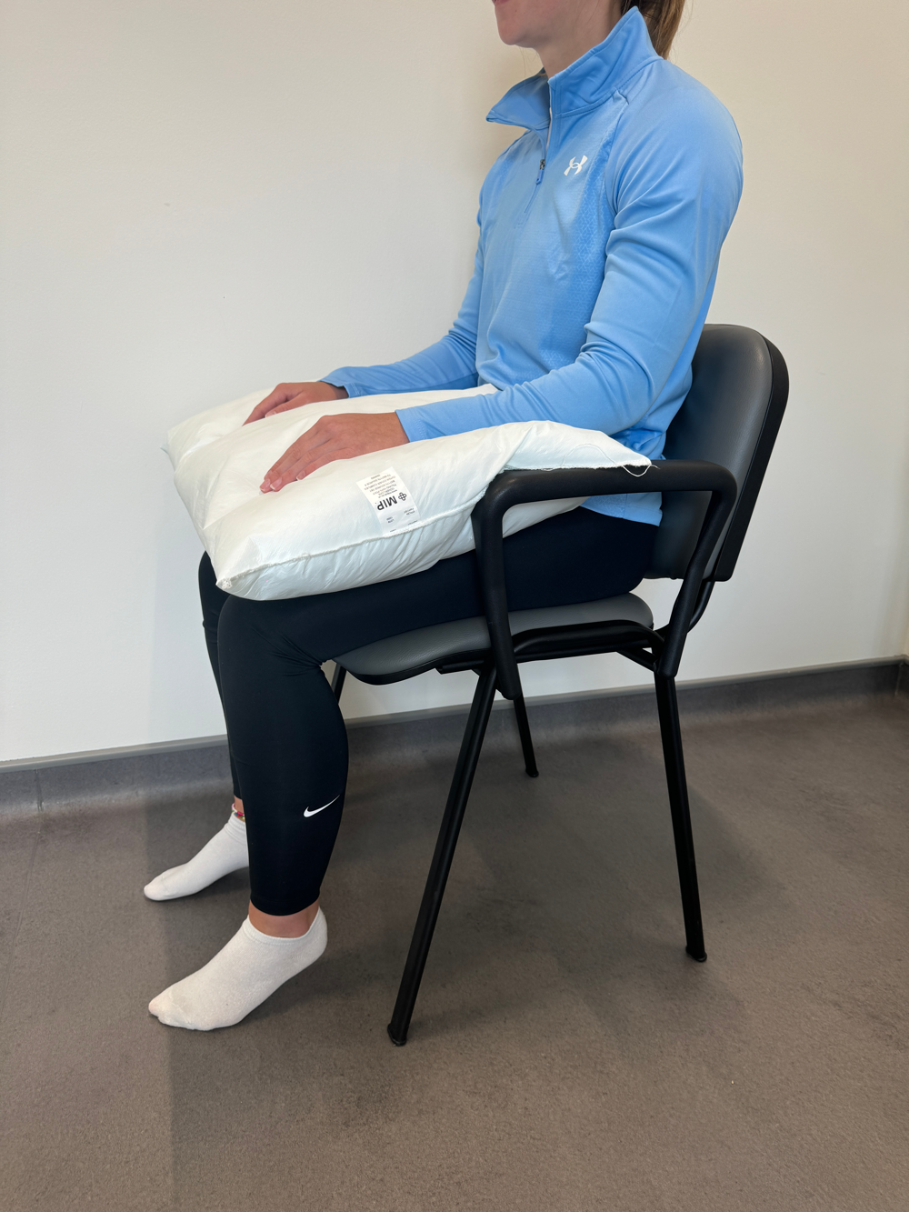 Support Arm On Pillow Lying On Lap
