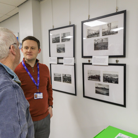 Two Men Speak About Pictures