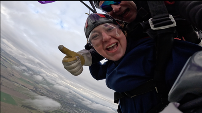 Elana Parachuting Thumbs Up
