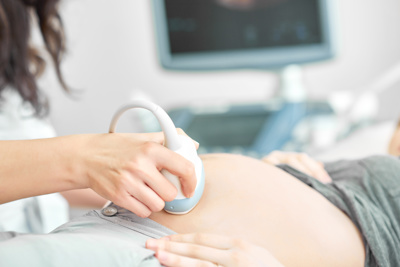 pregnant woman having an ultrasound scan