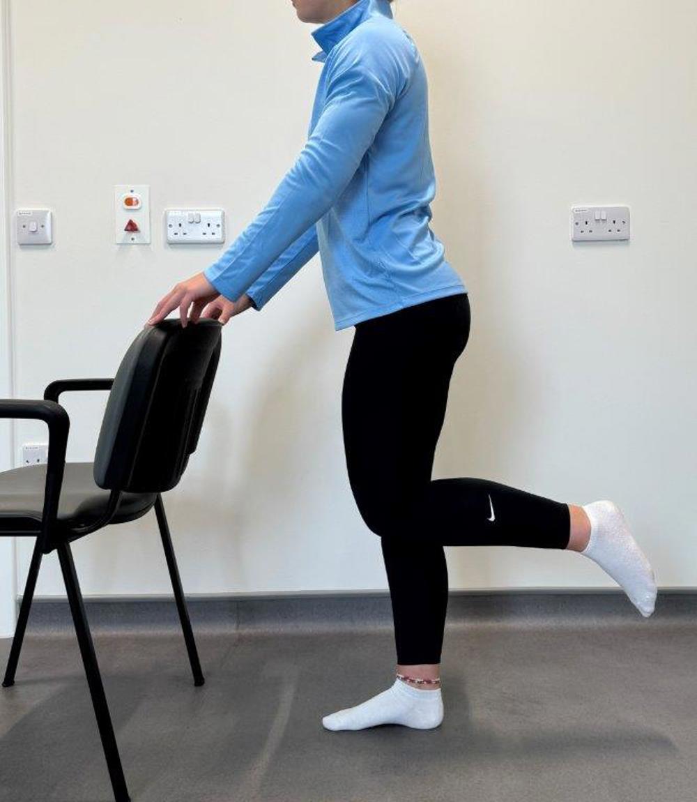 Stand Tall With Support Lift Heel To Buttocks