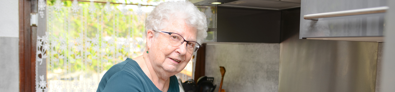 Older Woman Making Soup