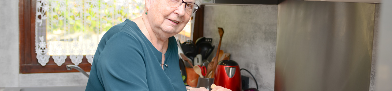 Older Woman Making Soup