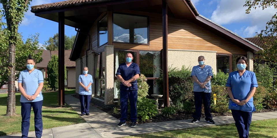 Care Home Imms Team pictured outside wearing masks